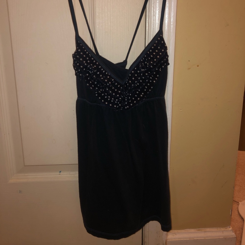 Navy tank top with white polkadot ruffles